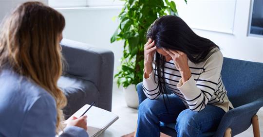Female employee sharing with human resources the sexual harassment she experienced.