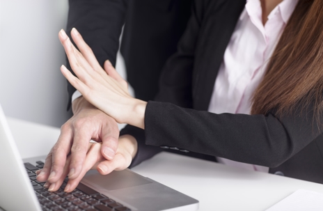 Business man touching woman hand feeling disgusted and uncomfortable.