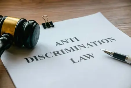 Anti discrimination law. Equality and human rights concept.Court scene judgement attorney. Document and gavel on wooden table.