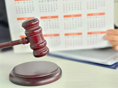 gavel in front of calendar